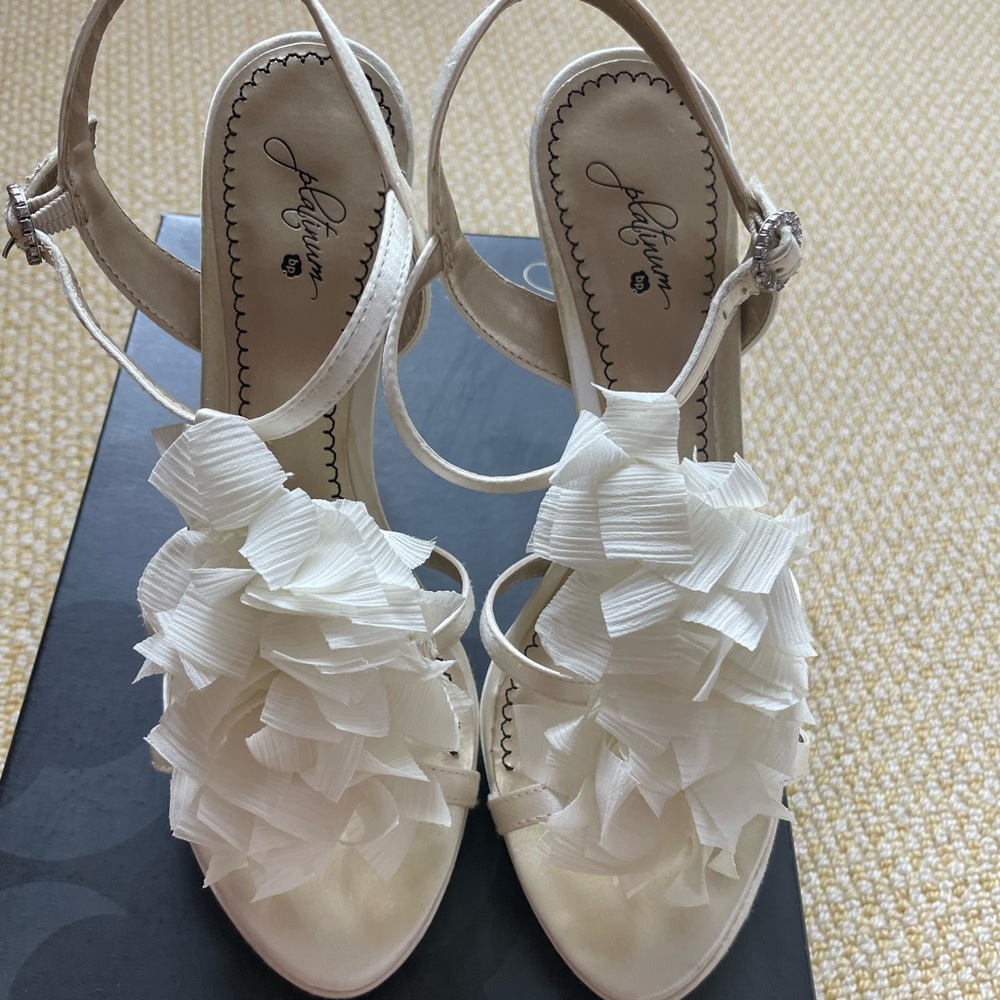 White strappy heels with fun front